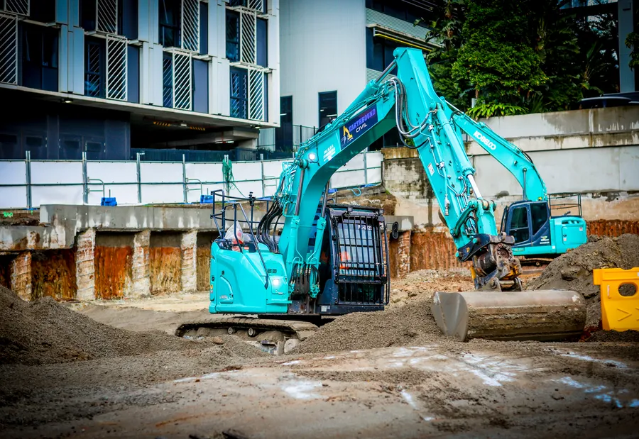 Earthbound Civil Kobelco excavator working a commercial earthworks site